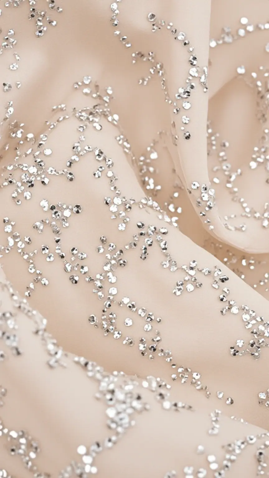 2,500 crystals and sheer silk. The technical mastery of the Jean Louis gown Marilyn Monroe.